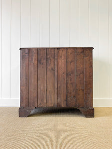 An Ebonized Antique English Chest of Drawers/Dresser