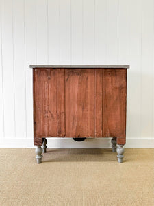 A 19th Century Bow Front English Chest of Drawers or Dresser