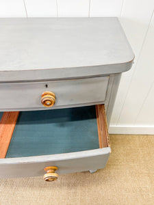 A 19th Century Bow Front English Chest of Drawers or Dresser