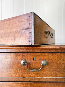 A English Georgian Oak Chest of Drawers with Swan Neck Hardware c1800