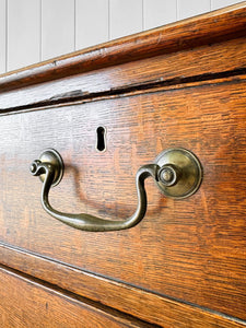 A English Georgian Oak Chest of Drawers with Swan Neck Hardware c1800