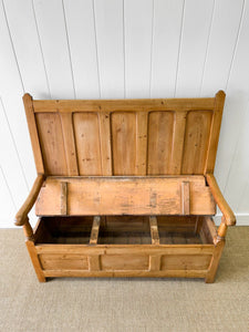 An Antique English 19th Century Pine Settle