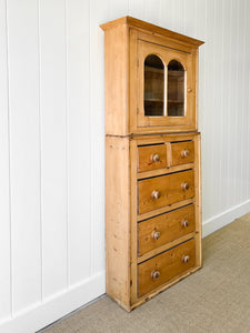 A Narrow Pine 19th Century Cupboard with Glazed Door