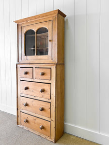 A Narrow Pine 19th Century Cupboard with Glazed Door