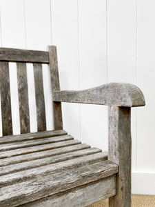 A Stylish English Teak Garden Bench