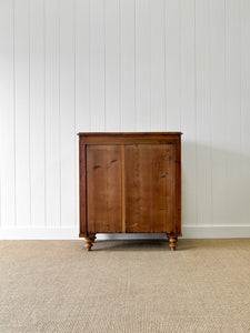 A 19th Century Bow Front English Chest of Drawers