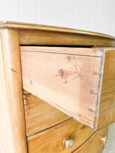 A 19th Century Bow Front English Chest of Drawers