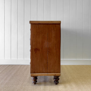 A 19th Century English Pine and Ash Chest of Drawers/Dresser with Tulip Feet