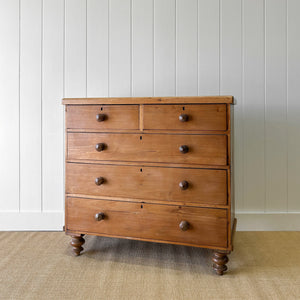 A 19th Century English Pine and Ash Chest of Drawers/Dresser with Tulip Feet