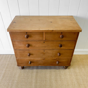 A 19th Century English Pine and Ash Chest of Drawers/Dresser with Tulip Feet