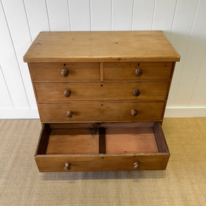 A 19th Century English Pine and Ash Chest of Drawers/Dresser with Tulip Feet