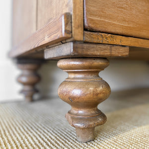 A 19th Century English Pine and Ash Chest of Drawers/Dresser with Tulip Feet