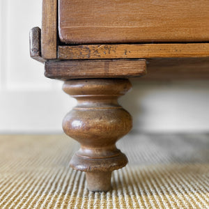 A 19th Century English Pine and Ash Chest of Drawers/Dresser with Tulip Feet