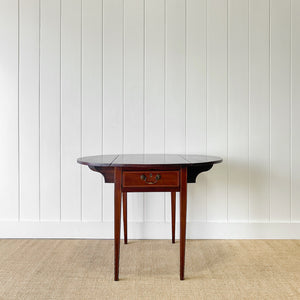 A George III Mahogany and Satinwood Crossbanded Pembroke Table