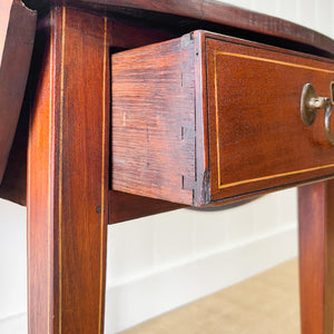 A George III Mahogany and Satinwood Crossbanded Pembroke Table