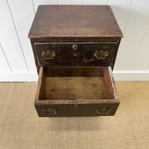 A Narrow Rustic Chest of Drawers with Chippendale Hardware Night Stand