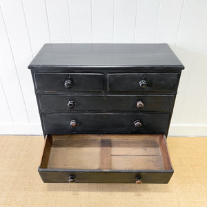 An Ebonized Antique English Chest of Drawers/Dresser