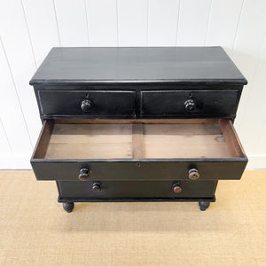 An Ebonized Antique English Chest of Drawers/Dresser