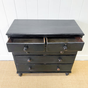 An Ebonized Antique English Chest of Drawers/Dresser