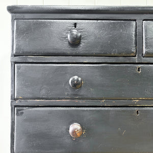 An Ebonized Antique English Chest of Drawers/Dresser