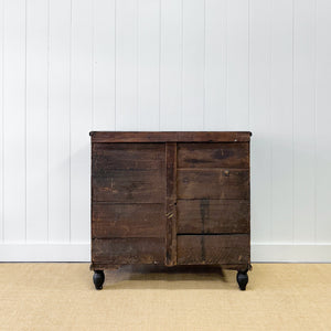 An Ebonized Antique English Chest of Drawers/Dresser