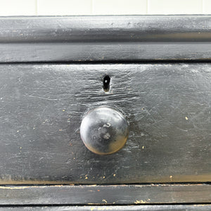 An Ebonized Antique English Chest of Drawers/Dresser