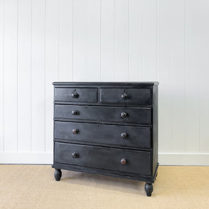 An Ebonized Antique English Chest of Drawers/Dresser