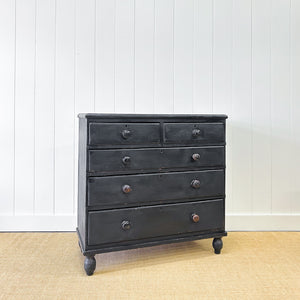 An Ebonized Antique English Chest of Drawers/Dresser