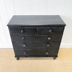 An Ebonized Antique English Chest of Drawers/Dresser