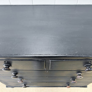 An Ebonized Antique English Chest of Drawers/Dresser