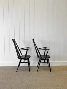 A Set of 4 Black Ercol Chairs