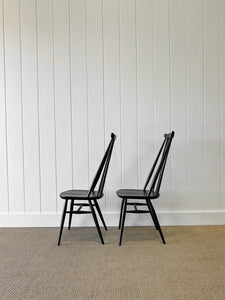 A Set of 4 Black Ercol Chairs