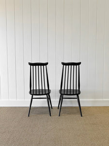 A Set of 4 Black Ercol Chairs