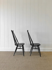 A Set of 4 Black Ercol Chairs