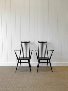 A Set of 4 Black Ercol Chairs