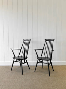 A Set of 4 Black Ercol Chairs