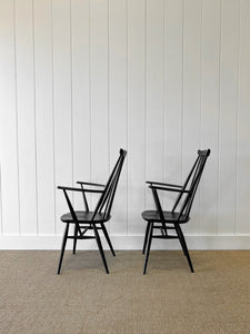 A Set of 4 Black Ercol Chairs