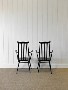 A Set of 4 Black Ercol Chairs