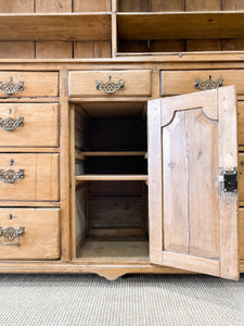 An Early 19th Century Pine Welsh Dresser or Cupboard with Chamfered Corners