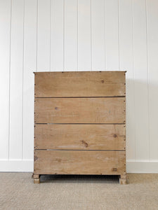 A 19th Century English Pine Glazed Bookcase on Bun Feet