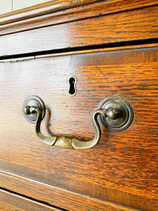 A English Georgian Oak Chest of Drawers with Swan Neck Hardware