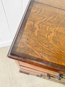 A English Georgian Oak Chest of Drawers with Swan Neck Hardware