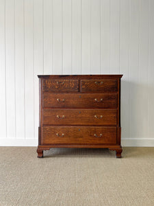 An Antique Georgian Oak and Mahogany Chest of Drawers