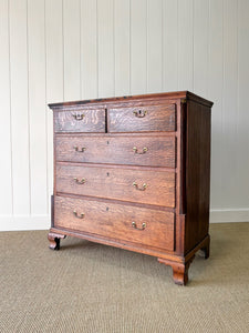 An Antique Georgian Oak and Mahogany Chest of Drawers