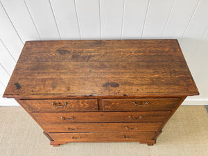 An Antique Georgian Oak and Mahogany Chest of Drawers