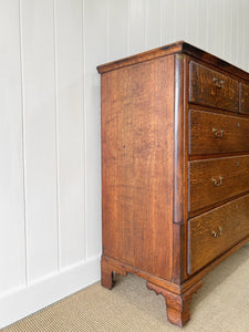 An Antique Georgian Oak and Mahogany Chest of Drawers