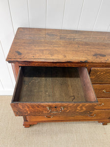 An Antique Georgian Oak and Mahogany Chest of Drawers