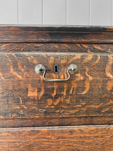 An Antique Georgian Oak and Mahogany Chest of Drawers