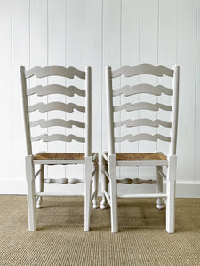 A Pair of Ladderback Rush Seat Chairs Painted White