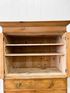 An 18th Century English Pine Linen Press Cupboard